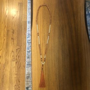 Beaded necklace with tassel